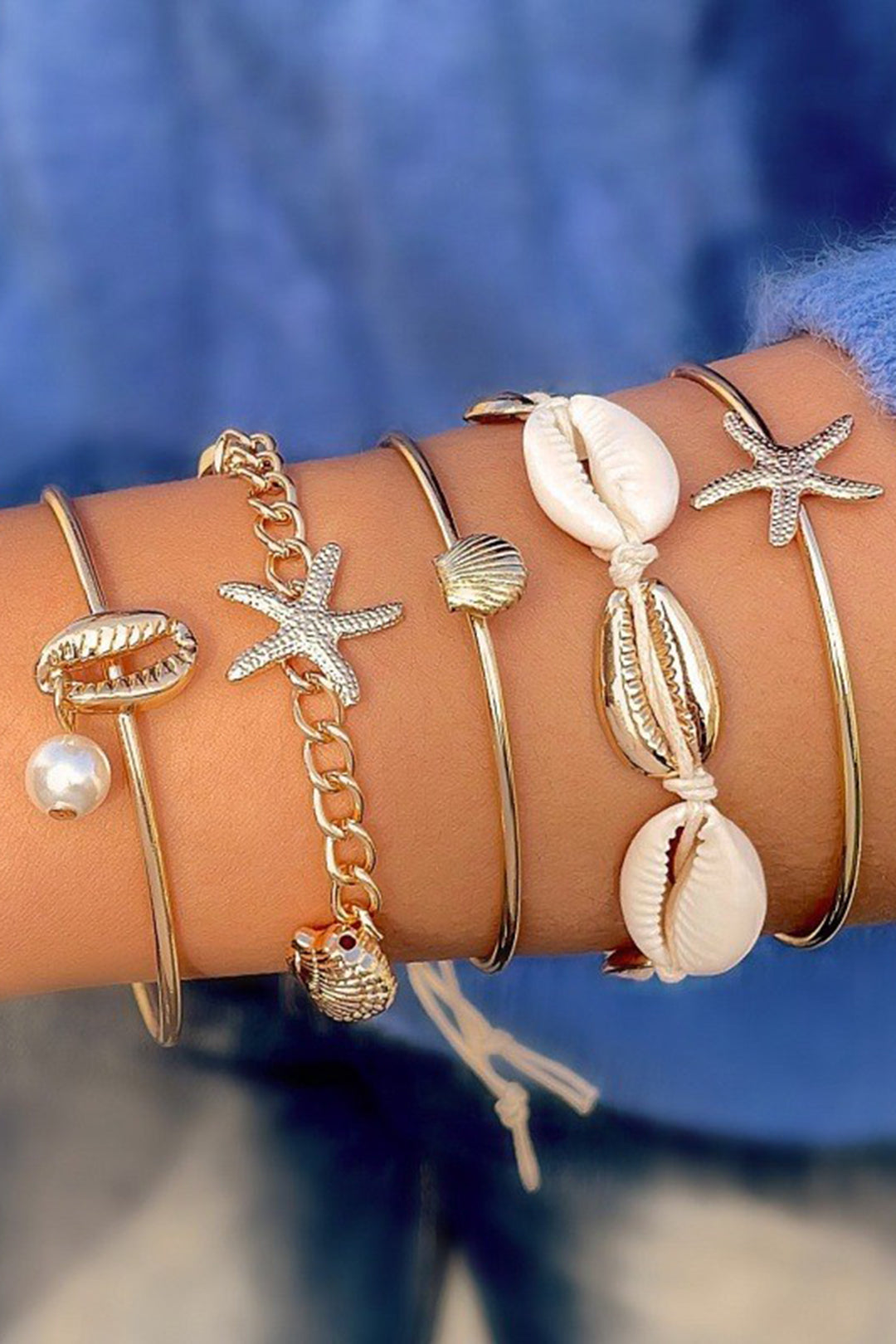 BRACCIALE CON CONCHIGLIE E STELLE MARINE