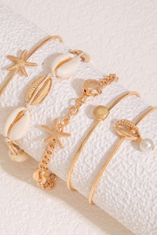 BRACCIALE CON CONCHIGLIE E STELLE MARINE